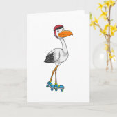 Carte Cigogne en patineur en ligne avec des patins à rou (Fleur jaune)