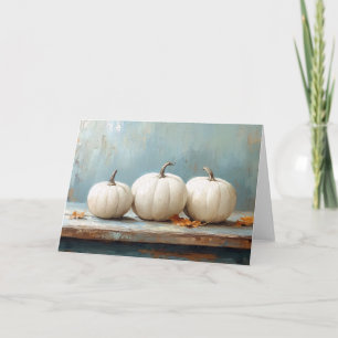 Carte Citrouilles blanches sur une vieille table bleue