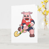 Carte Cochon au hockey avec une batte de hockey (Fleur jaune)