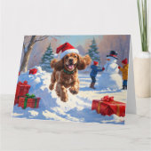 Carte Cocker Spaniel coule dans la neige avec le Casquet (Devant)