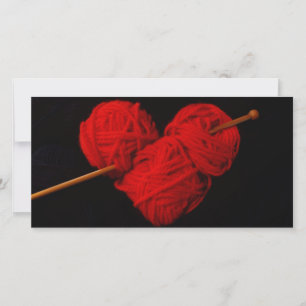 Carte Coeur en laine rouge avec aiguille tricot photo