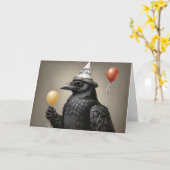 Carte Corbeau tenant un ballon jaune heureux casquette d (Fleur jaune)