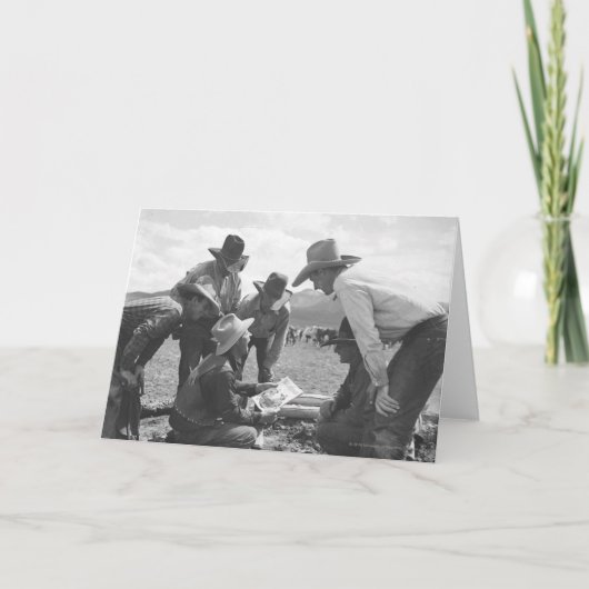 Carte Cowboys regardant une magazine (Devant)