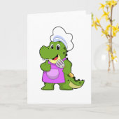Carte Crocodile comme cuisinier avec spatule (Fleur jaune)