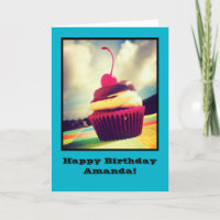Cupcake coloré avec cerise en haut