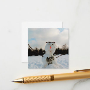 Carte D'accompagnement Un vrai bonhomme de neige et une photo de paysage 