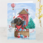 Carte Dachshund dans une maison pour chien de Noël ennei (Fleur jaune)
