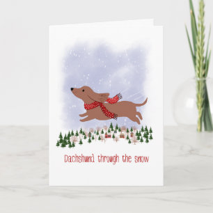 Carte Dachshund de Noël à travers la neige