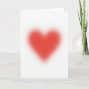 Carte d'amour à cœur rouge flou