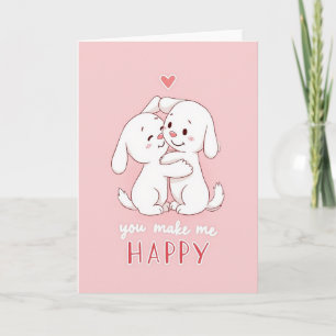 Carte d'amour avec un câlin de chiots heureux