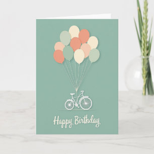 Carte d'anniversaire avec des ballons et un vélo