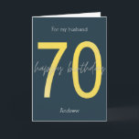 Carte d'anniversaire Blue and Gold 70th<br><div class="desc">Carte marine personnalisée bleu et or 70ème anniversaire pour mari. Les caractéristiques avant du numéro 70 en or avec un joyeux message d'anniversaire. Vous pourrez facilement personnaliser l'avant avec son nom, le message d'anniversaire de la carte intérieure et l'arrière avec l'année. Cette carte personnalisée de la 70ème fera un merveilleux...</div>