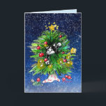 Carte de joie Treemendous !<br><div class="desc">Enveloppez-vous dans la lueur chaleureuse des lumières de la saison. Ce chat noir et blanc est joyeusement enchevêtré dans un arbre de lumières. *Notez que vous pouvez modifier, supprimer ou changer l'un des textes... il y a deux champs de texte, vous pouvez également en ajouter un troisième si vous souhaitez...</div>