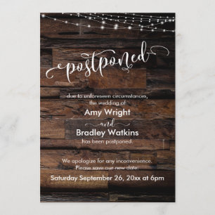 Carte de mariage reporté avec guirlande de lumière