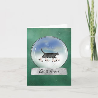 Carte de Noël avec boule à neige représentant un c
