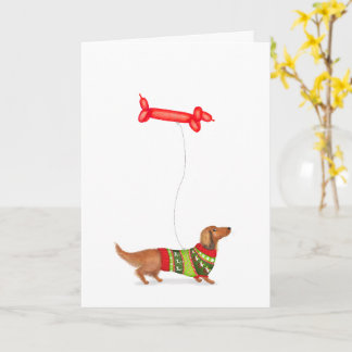 Carte de Noël avec dachshund et ballon en forme de