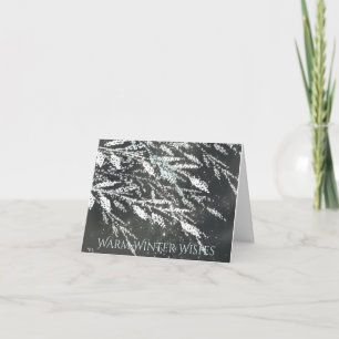 Carte de Noël avec des branches enneigées