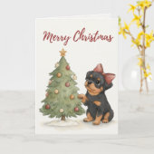 Carte de Noël avec un chiot Rottweiler mignon (Fleur jaune)