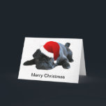 Carte de Noël de carlin<br><div class="desc">Ce carlin noir mignon regarde comme il veut jouer avec vous, ou Père Noël ou même le renne et lui vraiment semble adorable dans son petit casquette de Père Noël. Quelle vue de fête à voir sur une carte. Cette carte de Noël est magnifique que n'importe quel enthousiaste de carlin...</div>