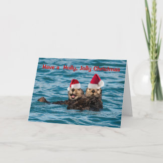 Carte de Noël de la faune, loutres portant des cha
