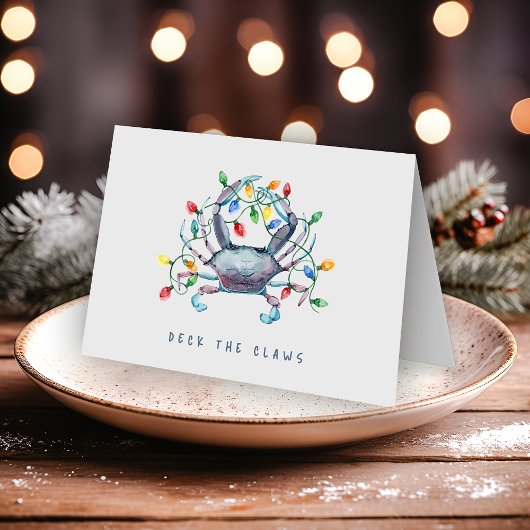 Carte de Noël « Deck the Claws » pliée sur le thèm