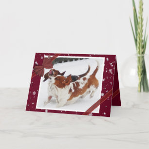 Carte de Noël mignonne avec Basset Hounds en neige