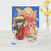 Carte de Noël mignonne avec des anges jouant avec  (Fleur jaune)