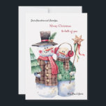 Carte de Noël Snowman Couple<br><div class="desc">Une charmante carte de Noël avec un couple de bonhomme de neige et de femme des neiges habillé pour les vacances. Carte de voeux parfaite pour grands-parents ou de grands-parents à tous. (Photo de Toniatkach sur Freepik). La carte est facile à customiser avec votre libellé, police et couleur de police....</div>
