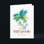 Carte de Noël Tropical Beach<br><div class="desc">Ces cartes de Noël de plage sont ornées d'un palmier exotique d'inspiration insulaire et de Père Noël de vacances mignonnes. Les mots "Merry Beach-mas" sont placés en lettres à la main. Utilisez les champs modèle pour ajouter votre salutation personnalisée. Un choix charmant à envoyer à vos amis et à votre...</div>