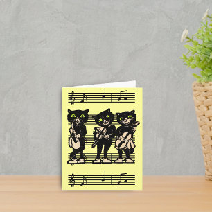 Carte de note musicale de chats noirs