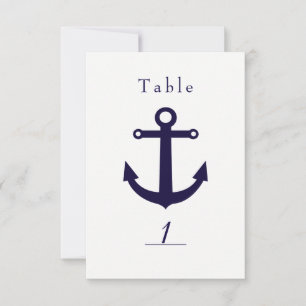 Carte de numéro de table blanche et ancre bleu mar