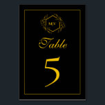 Carte de numéro de table de la crête de monogramme<br><div class="desc">Carte de numéro de table de la crête de monogramme noir et or</div>