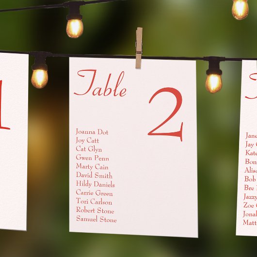 Carte de plan de table de mariage à coeurs roses