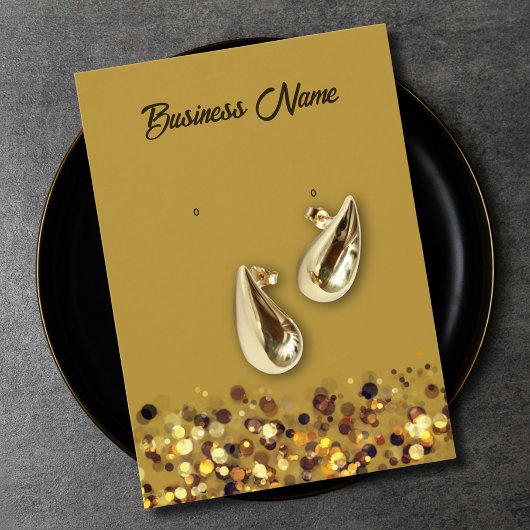 Carte de présentation de boucles d'oreilles avec Q
