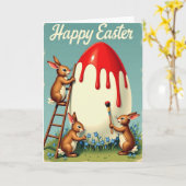 Carte de printemps de lapins peignant un œuf (Fleur jaune)