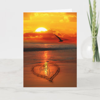 Carte De Remerciements Écrit dans le sable sur le coucher de soleil de la