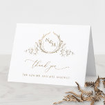 Carte De Remerciements Élégant Mariage de Monogramme Or<br><div class="desc">Merci à vos invités avec un élégant carte de remerciements de mariage personnalisé! Conception avec un magnifique monogramme botanique en faux feuille d'or dessiné à la main avec les initiales du couple, phrase de remerciement élégante, et section de texte pour le personnaliser comme vous le souhaitez. Option pour ajouter une...</div>