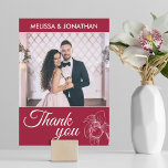 Carte De Remerciements Elegant orchids floral modern red wedding photo<br><div class="desc">This romantic and delicate orchids photo thank you card is perfect for an elegant wedding. The floral design features a sophisticated white orchids line drawing over a crimson red background. Personalize the card with your favorite wedding day picture and your names on the front, and your custom thank you message,...</div>