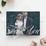 Carte De Remerciements Élégant Script Flourish White Photo Mariage<br><div class="desc">Élégant Script Flourish White Photo Mariage Carte de remerciements | Envoyez des remerciements à votre famille et à vos amis pour avoir participé à votre journée spéciale avec cette carte à plat personnalisable. Il présente une superposition de script "merci" avec motif art déco. Vous pouvez customiser le motif en ajoutant...</div>