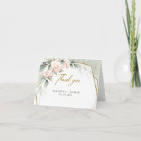 Fleurs roses saumon et eucalyptus et cadre doré