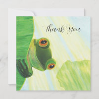 La grenouille verte aux gros yeux derrière un nénu