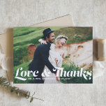 Carte De Remerciements Love and Thanks Retro Script Photo Mariage<br><div class="desc">Merci à vos invités en style avec notre carte de remerciements photo personnalisable mariage, avec l'expression "Amour & Merci" dans charmant script rétro. Cette photo carte de remerciements combine magnifiquement le sentiment personnel avec une touche de vintage flair. Montrez votre photo mariage préférée, vous permettant de partager un aperçu de...</div>