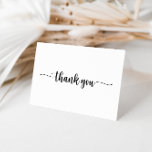 Carte de remerciements Mariage plié de calligraphi<br><div class="desc">Ce carte de remerciements mariage plié calligraphie est parfait pour un mariage moderne. Le design sobre et élégant présente une typographie de script classique et sophistiquée en noir et blanc. Personnalisez l'intérieur de la carte avec vos noms, et un message de remerciement. Ou laissez la section de message de remerciement...</div>