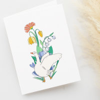 Oie de printemps en flanc de fleurs