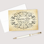 Carte De Remerciements Vintage Rustic Black Flourish Mariage<br><div class="desc">Des tourbillons et des fioritures décoratifs noirs encadrent cette élégante typographie vintage mariage Merci note design. L'arrière - plan d'ivoire rustique est imprimé avec une texture de papier parchemin vieilli. Personnalisez le texte monogramme sur le capot avant et le texte à l'intérieur avec un message personnalisé.</div>