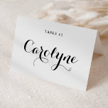 Carte de table de mariage en calligraphie moderne<br><div class="desc">Élevez votre réception de mariage avec nos magnifiques cartes de table de mariage personnalisables, conçues pour ajouter une touche personnelle à votre jour spécial. Elles présentent une calligraphie noire moderne et un accent de cœur. Ajoutez les noms de vos invités, la date du mariage ou un message spécial. Transformez vos...</div>