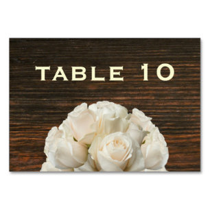 Carte de table Mariage en bois et roses blanches