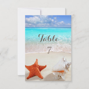 Carte de table mariage sur la plage coquillages
