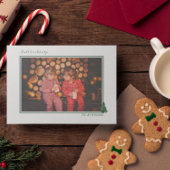 Carte de vacances À feuillage persistant et plaid