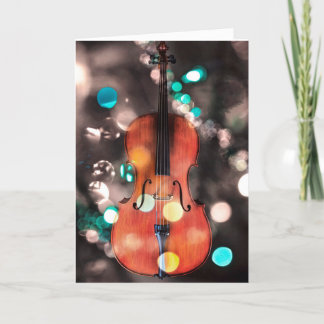 Carte de vacances de violoncelle festive